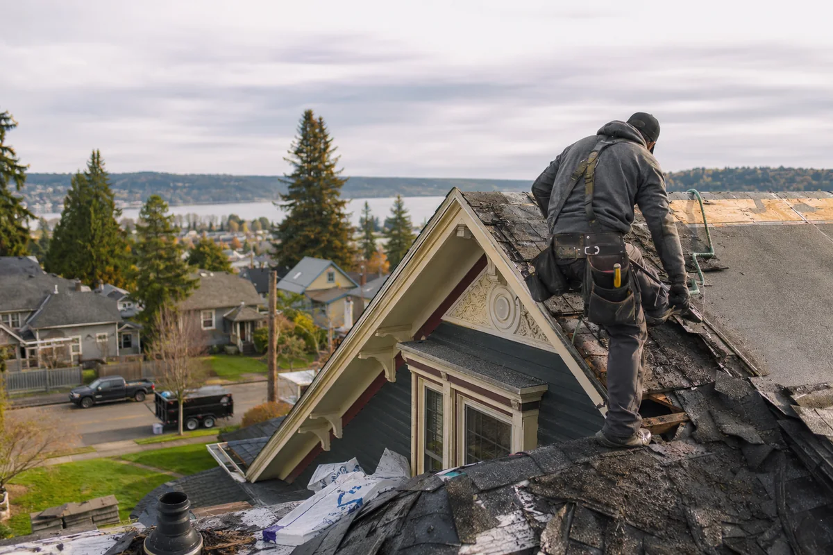 Roofing crew working on a property in Steilacoom, WA